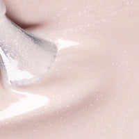 Gloss - with an iridescent pink shimmer - semi-opaque glittery