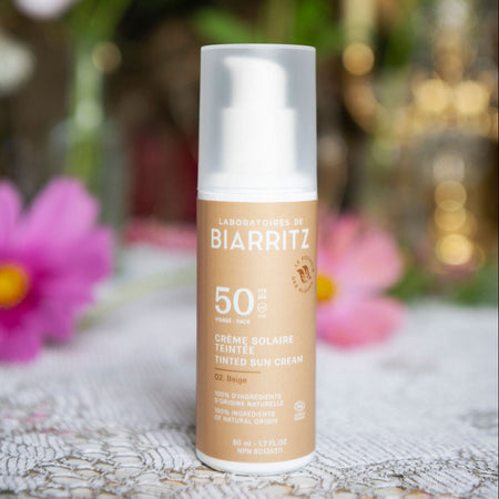 A bottle of Biarritz Crème Solaire Tintée Sun Tinted Sun Cream SPF 50+