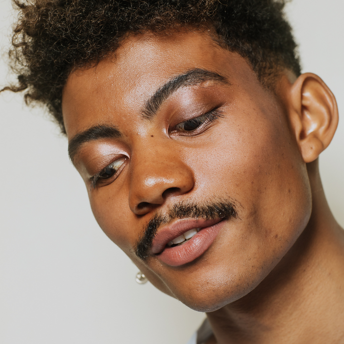 Model wearing Elate Cosmetics LipColour Pencil in Immerse, natural, clean, zero waste, sustainable, vegan cosmetics