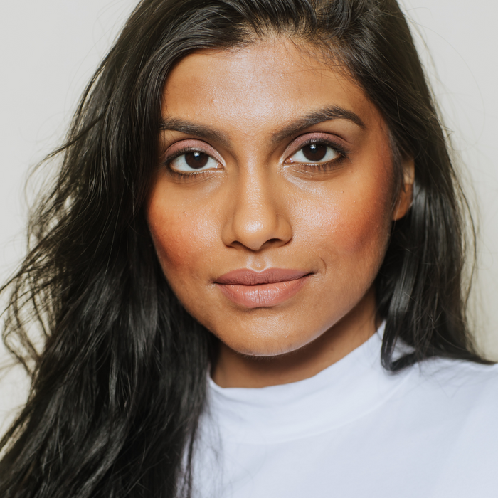 Model wearing Elate Cosmetics LipColour Pencil in immerse, natural, clean, zero waste, sustainable, vegan cosmetics