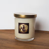 luxury capricorn zodiac crystal infused intention candle on wooden tray