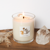 lit luxury air element crystal infused soy intention candle on wooden tray