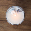 top view of lit luxury libra zodiac crystal infused soy intention candle