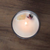 top view of lit luxury sagittarius zodiac crystal infused soy intention candle